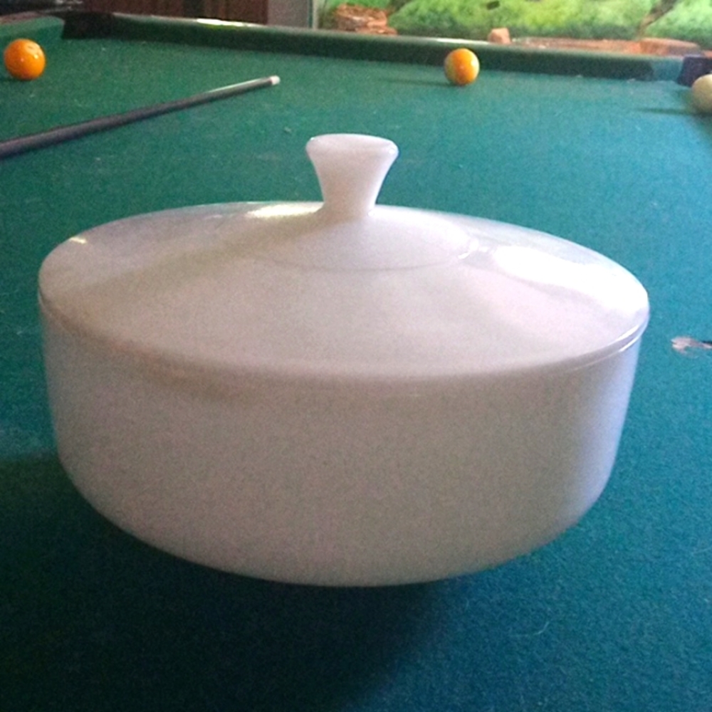 Vintage milk glass casserole dish with lid.